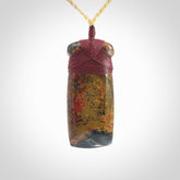 Hand carved Brecciated Jasper Toki Pendant.